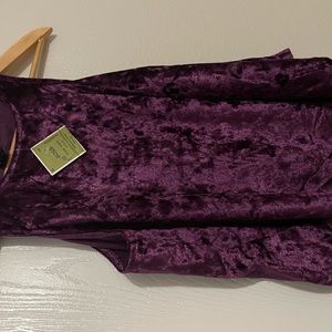 Plum /purple color, cute tank top never worn. Velvet material